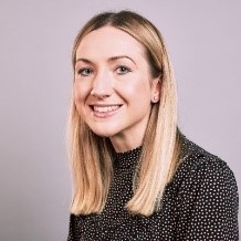 Alumna smiling